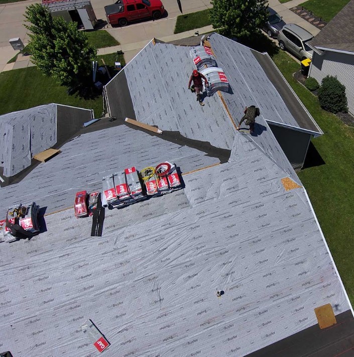 storm damage roof repair in Grimes, IA